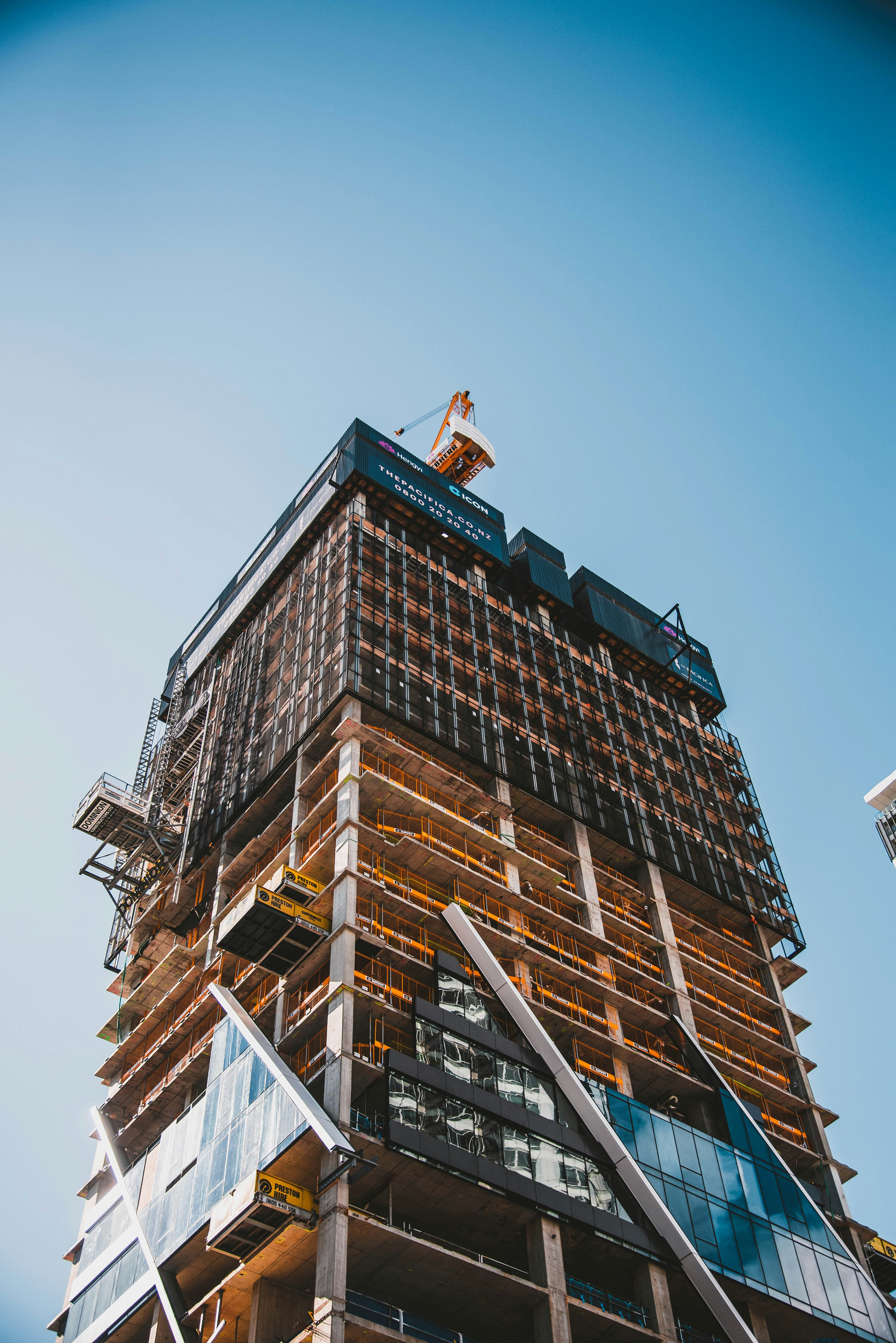 brown and gray building under construction